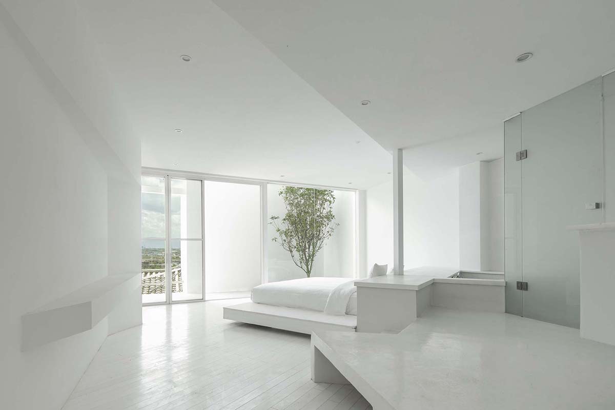 STUDIO QI reinterprets sequence of living conditions with tilted hotel on a hilly plot in China