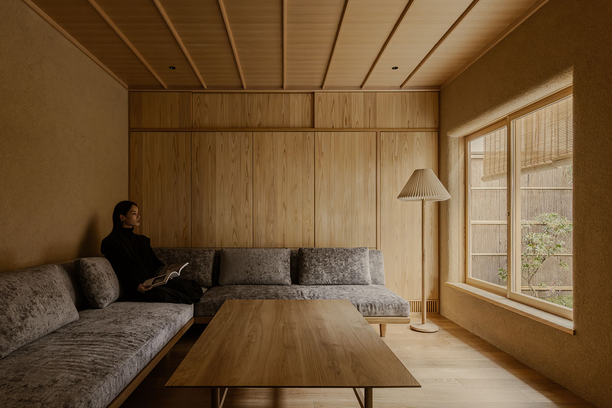 kooo architects creates a wooden interior sanctuary for contemporary accommodation in Kyoto City