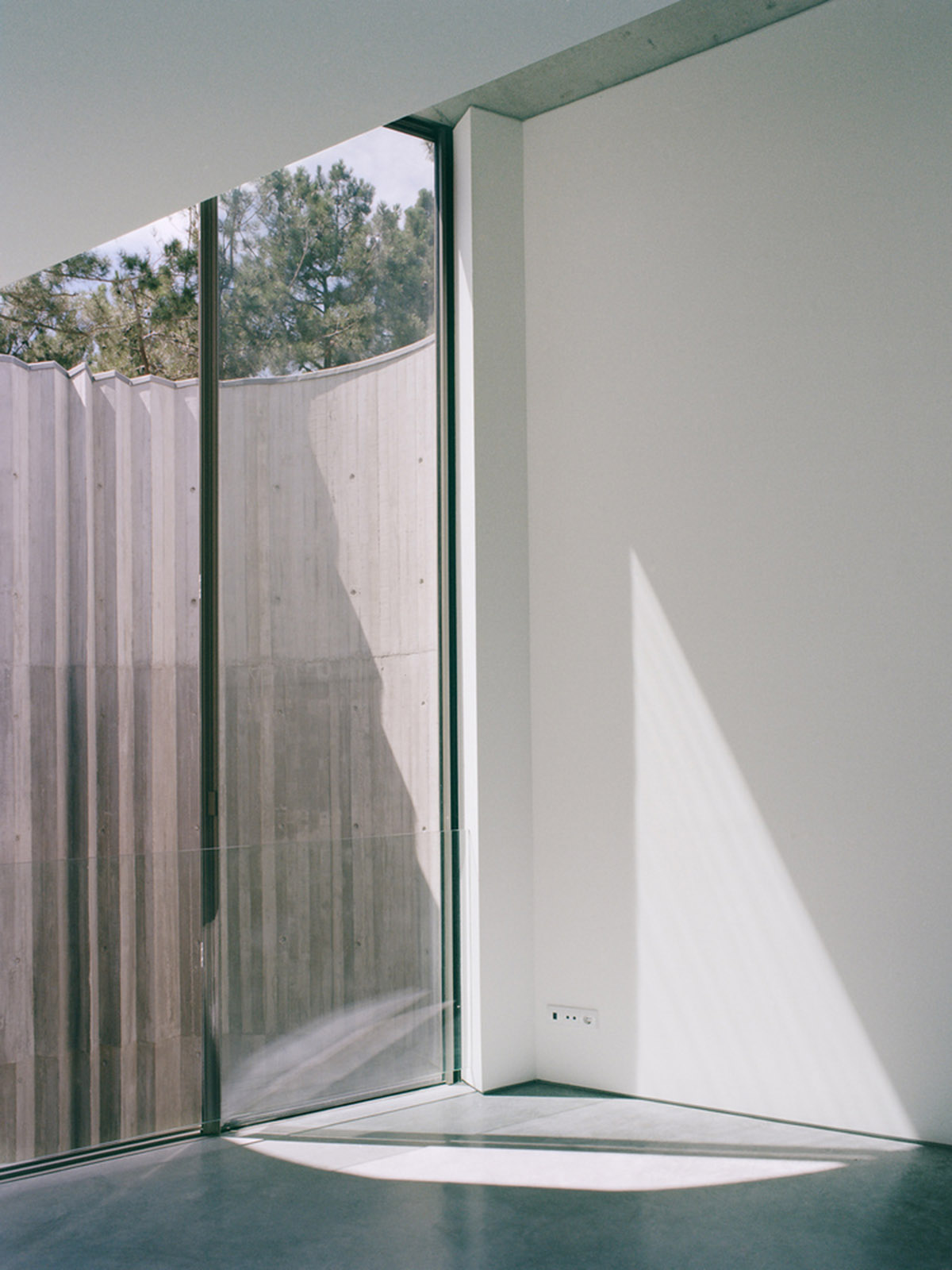 Double(o) Studio built Trefoil House with circular and hexagonal layout merged in one massing