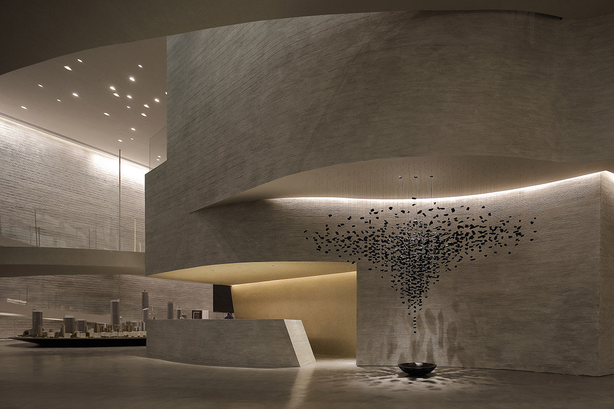 Waterfrom Design's art space features flowing walls to create