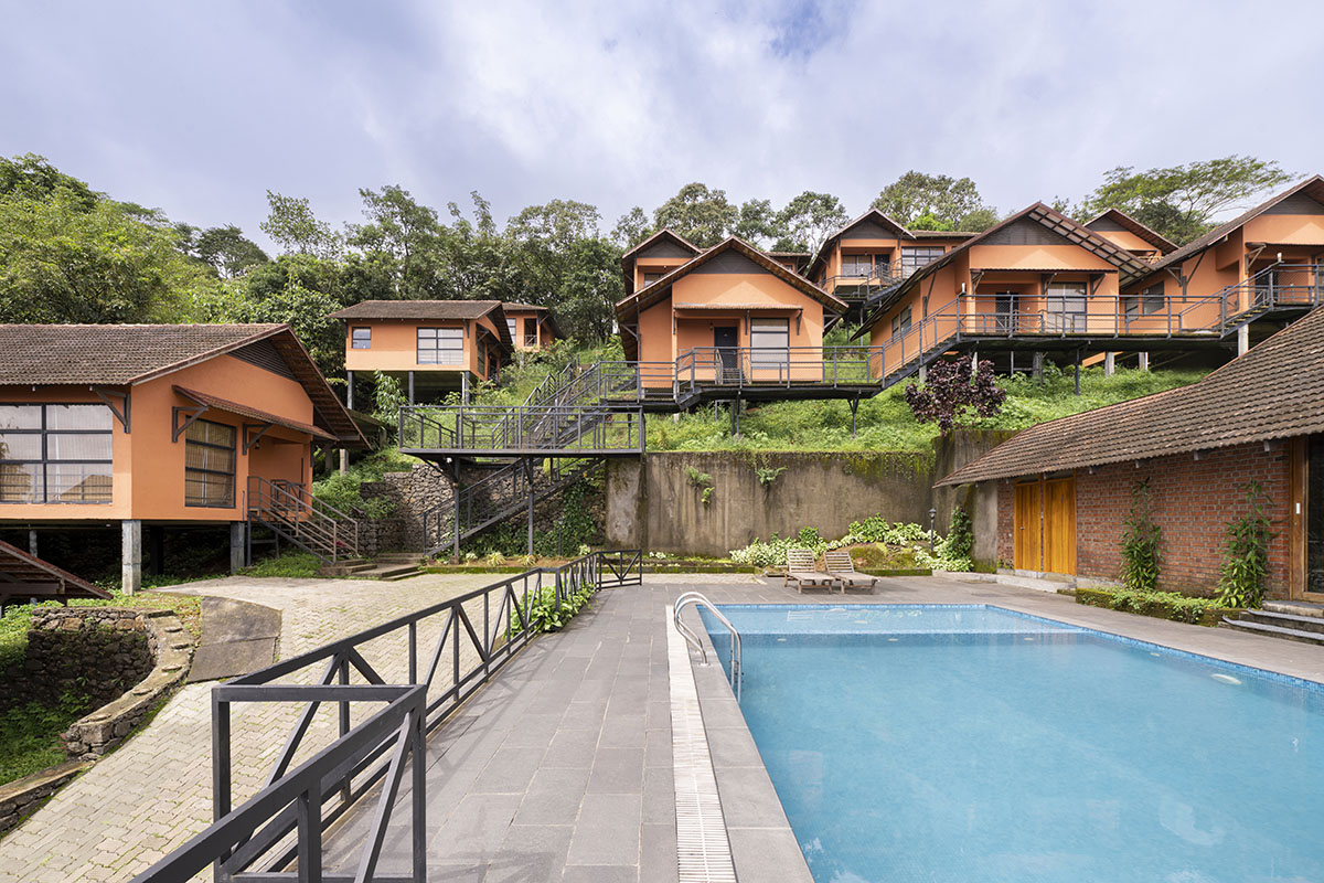 Srijit Srinivas - ARCHITECTS completes resort with dispersed villas in the hills of Idukki, India