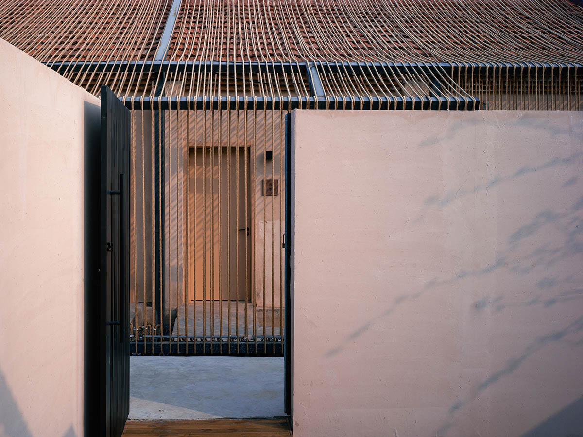 Domain Architects built boutique hotel with thatch roof and 60,000-metre hemp rope in rural Beijing