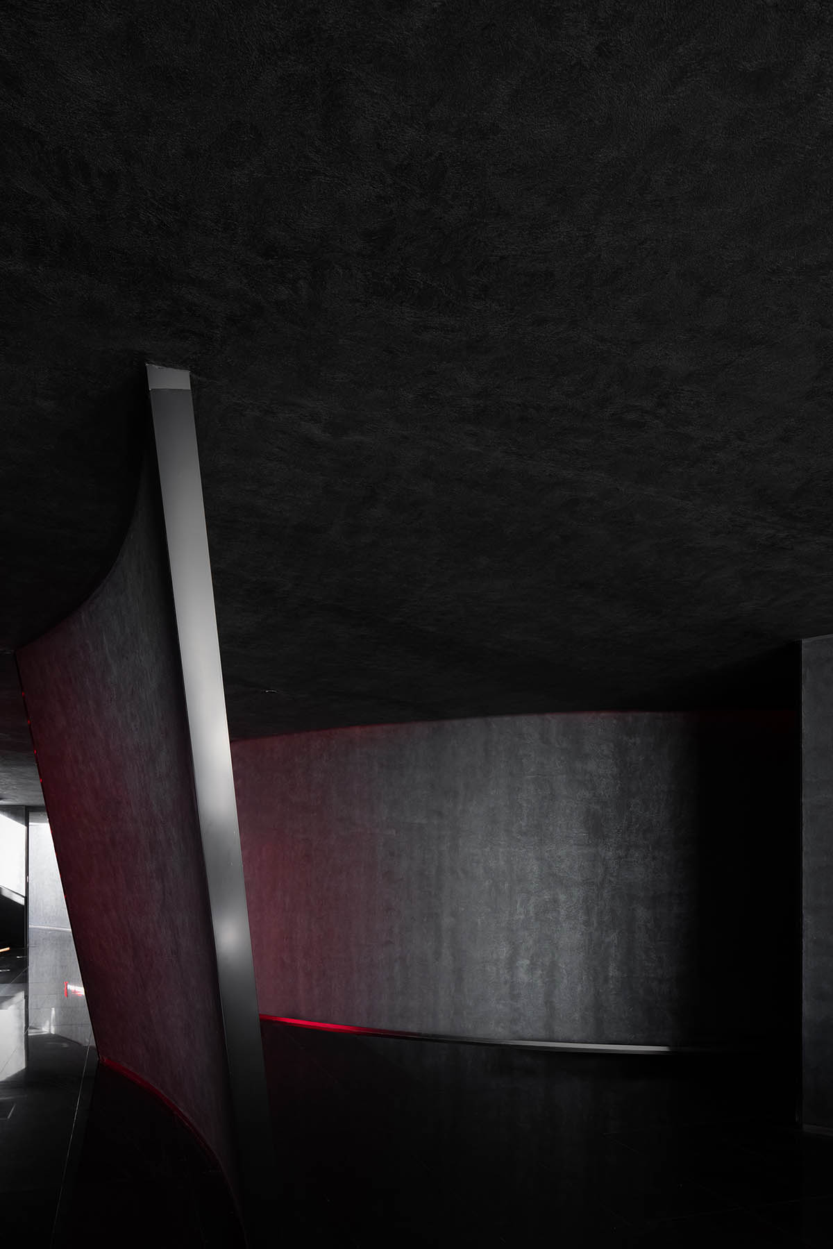 AD ARCHITECTURE designs restaurant in Beijing with black interiors creating a sense of mystery