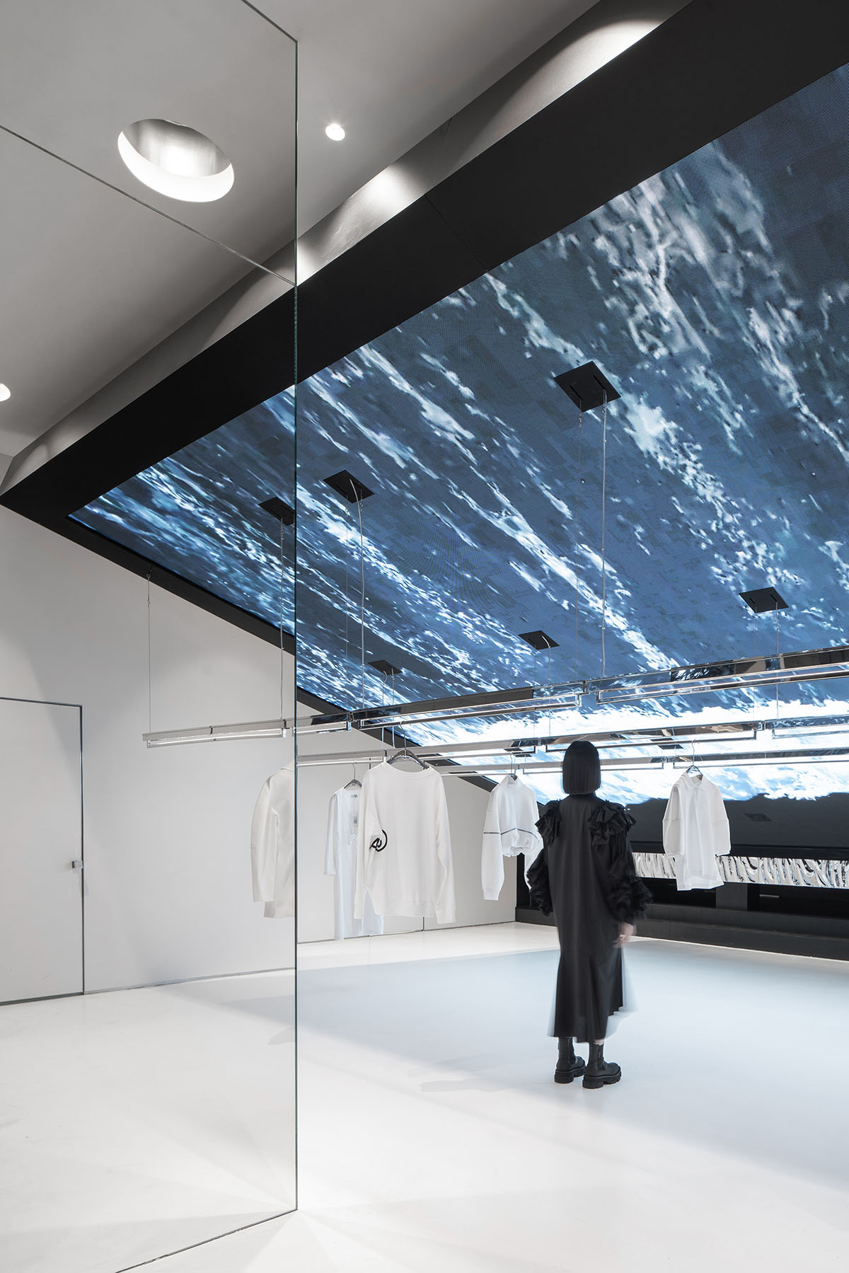 Various Associates integrates giant variable screens to interiors of fashion boutique in Chengdu
