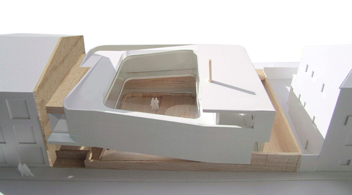 Antonio Costa Lima designs continuous inner gallery in Portugese house to overcome windowless fa&ccedil;ade