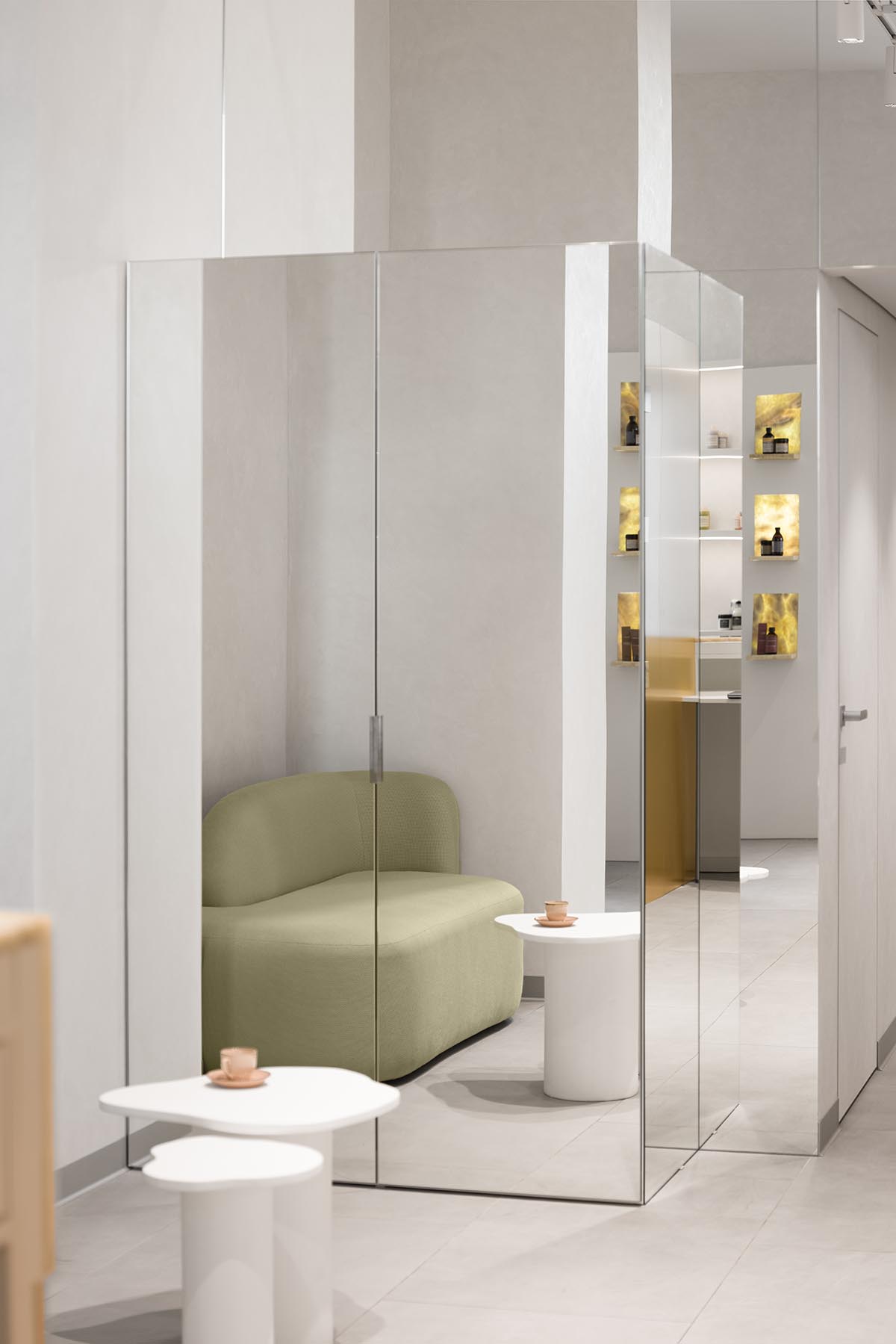 Mirrors and golden frames create a sense of care and deep comfort for beauty salon in Ukraine