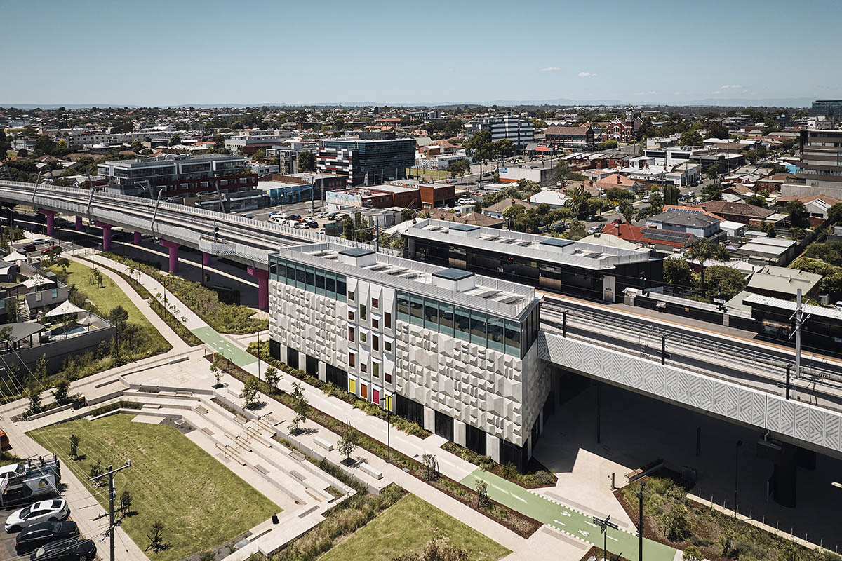 Wood Marsh abstracts Darebin’s roofscape into a 3D concrete pattern for Bell and Preston Stations