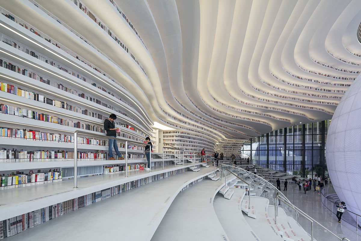 MVRDV’s topographical Tianjin Binhai Public Library featuring millions of books opens in China