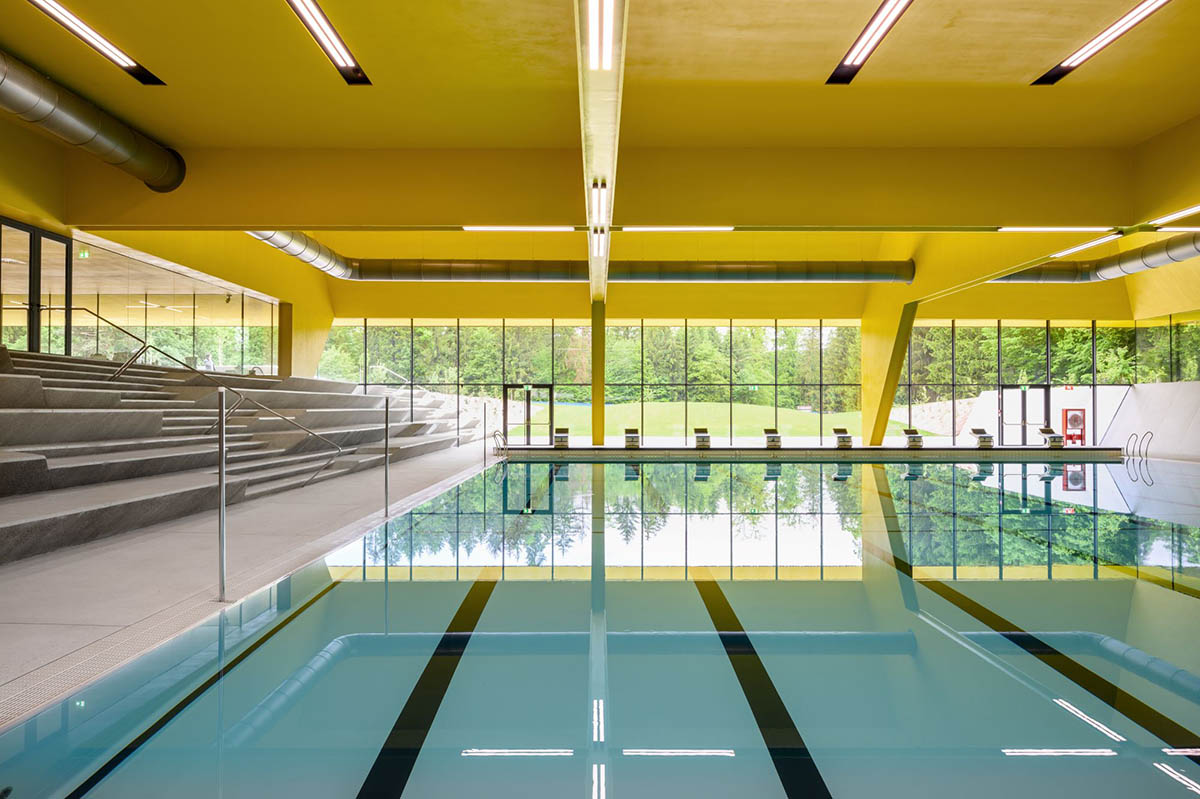 Enota completes swimming pool with low floating roof in Slovenia