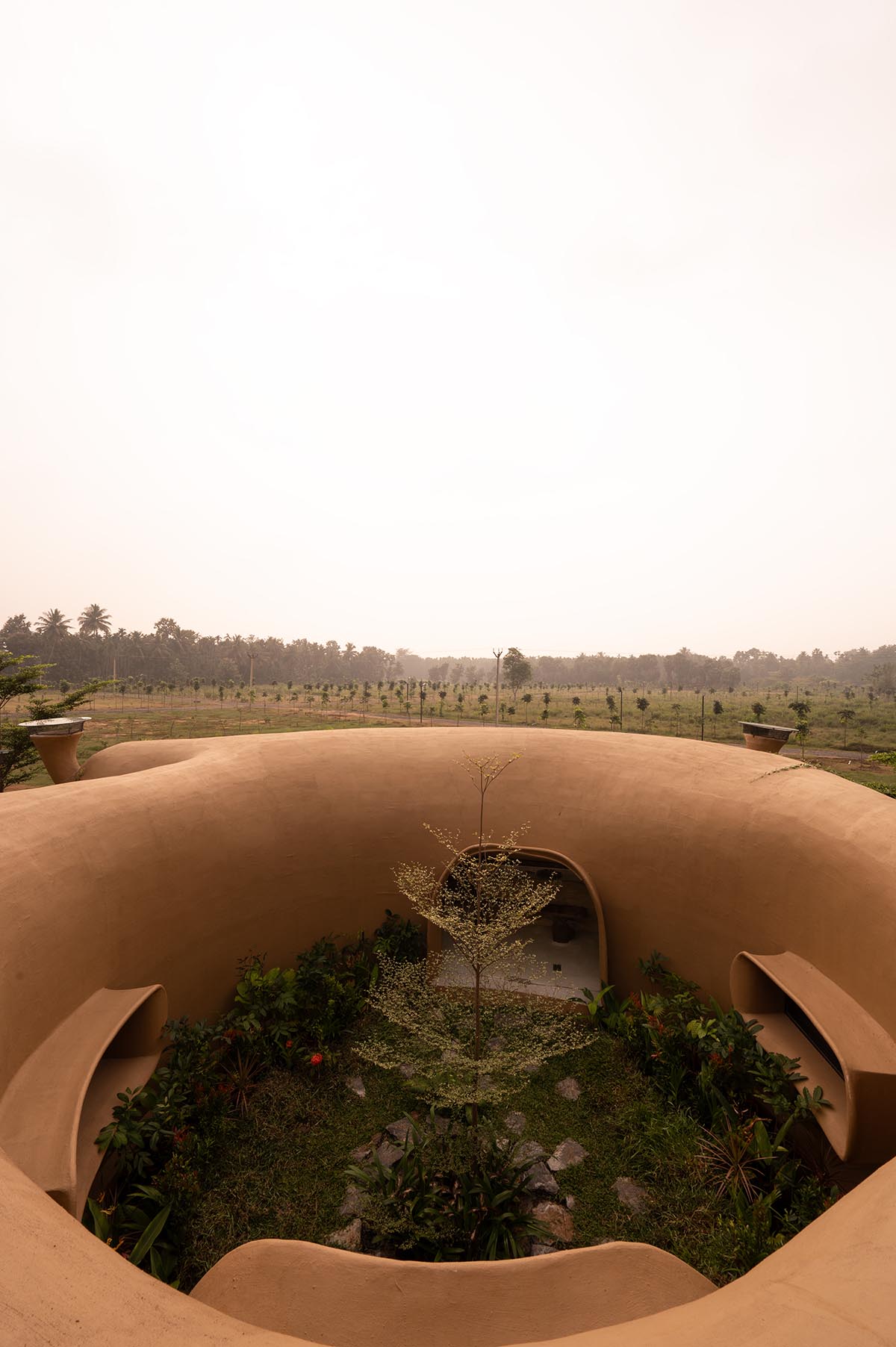 Cave-like farmhouse by Earthscape Studio provokes 