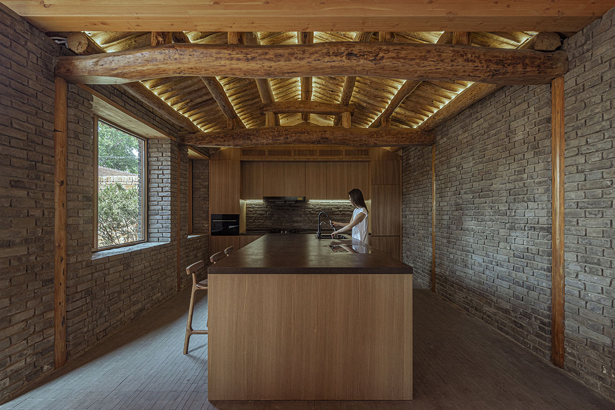 Archstudio renovates Beijing's old courtyard house with new wooden additions 