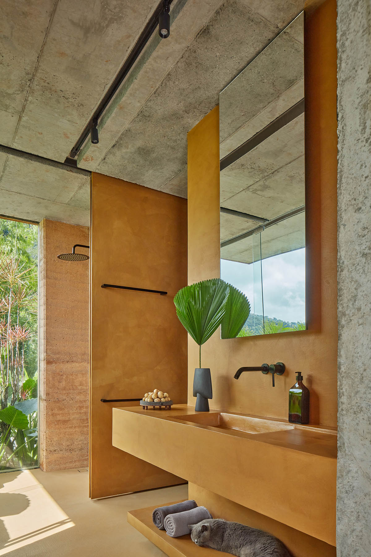 Twin rammed earth villas feature 