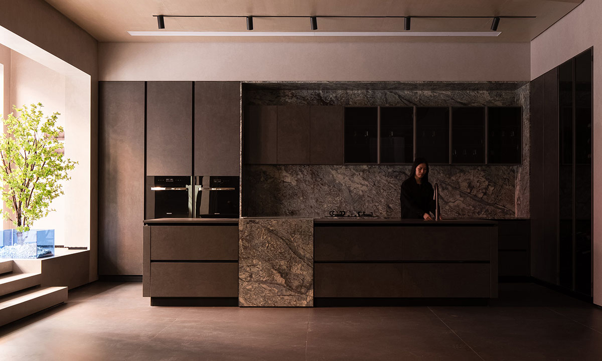 Exhibition hall interiors feature sharp angles and surfaces addressing diamond cutting processes