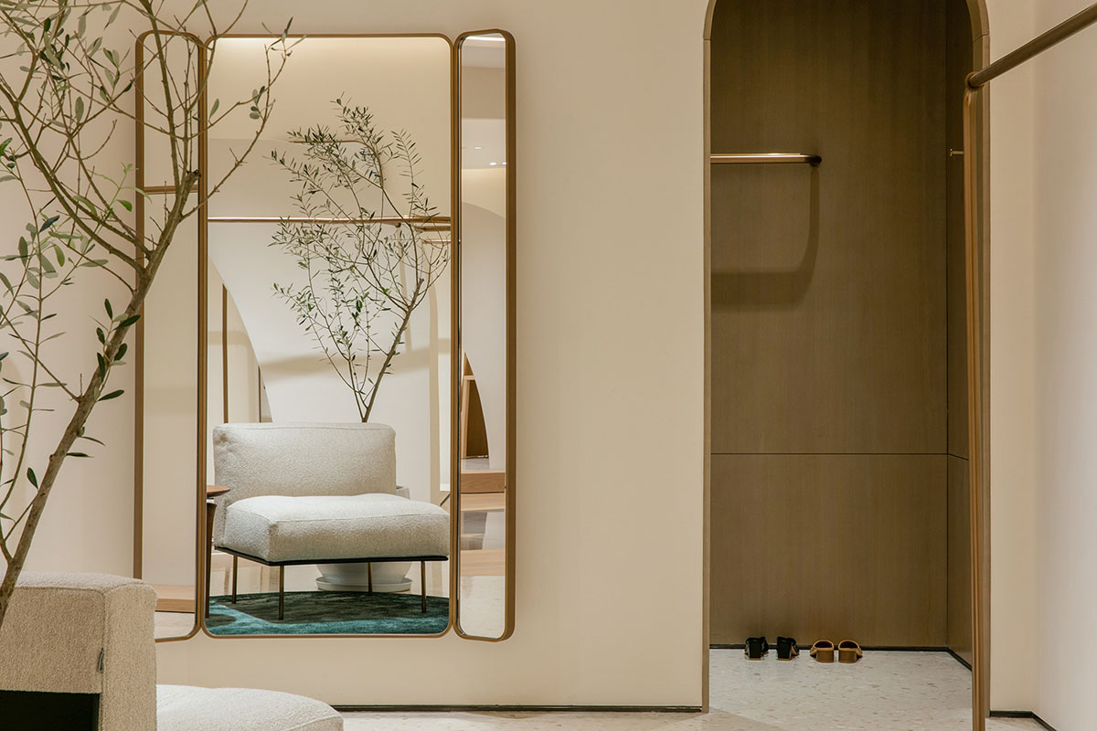 JYDP designs retail space with warm tones and curved walls in Shanghai