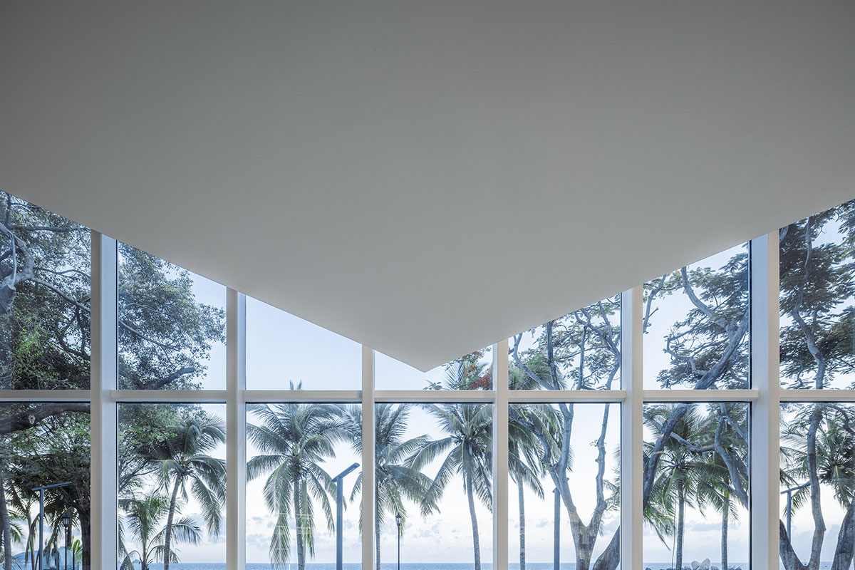 Wutopia Lab elaborates bookstore with red triangular bookshelves for Tianya Books in China 