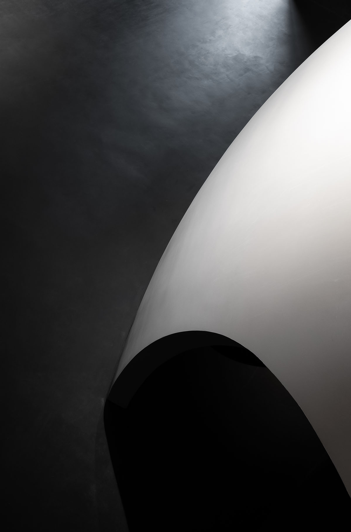 A beauty salon by AD ARCHITECTURE features dark-hued interiors drawing inspiration from cells