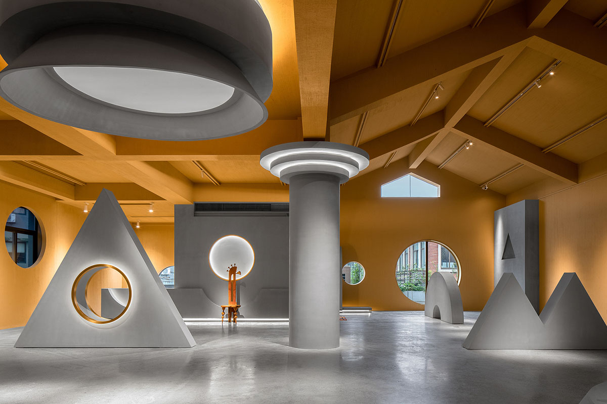 Angular corrugated stainless steel sheets form this showroom designed by PIG DESIGN in Hangzhou