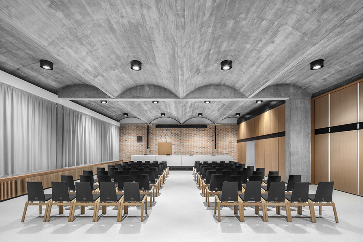 MoDusArchitects renovates Cusanus Academy with subtle elements in Bolzano, Italy