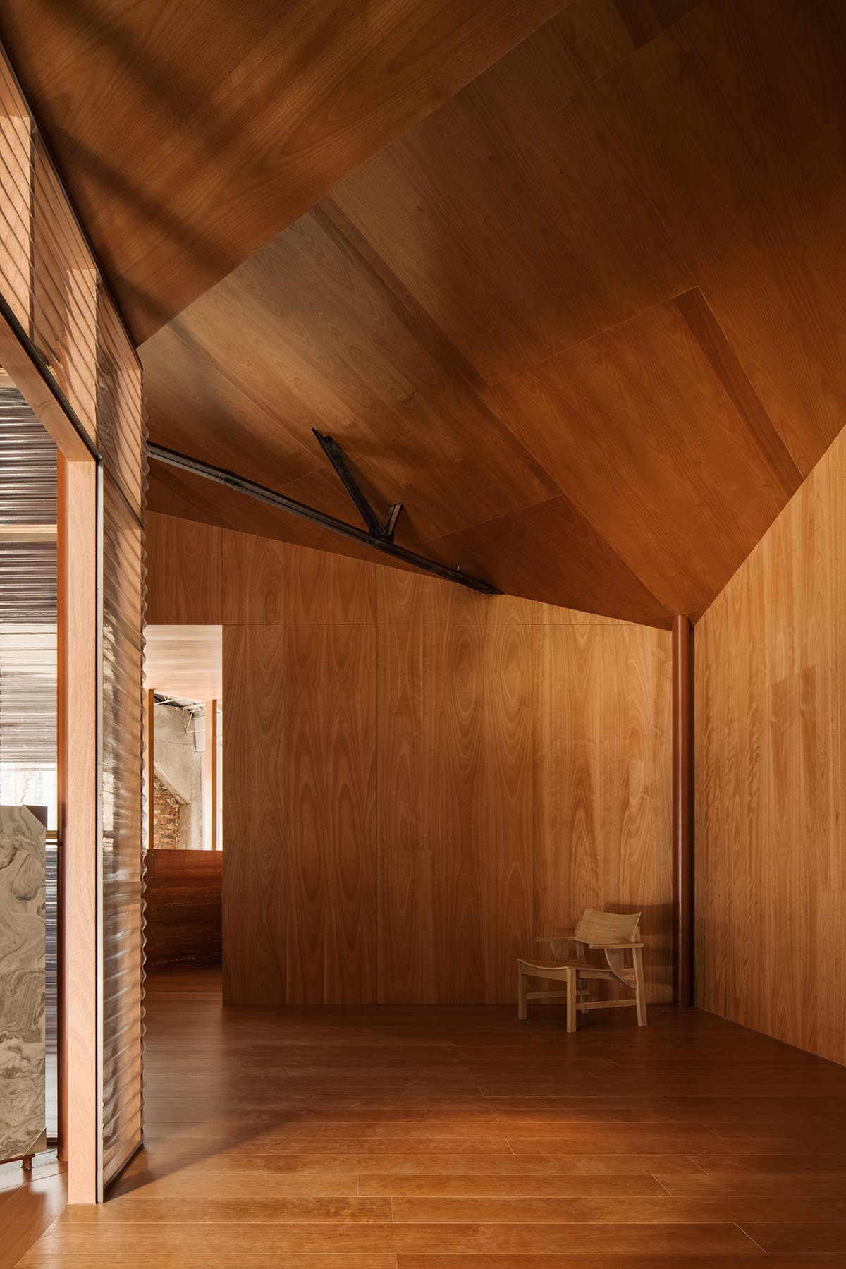 Atelier tao+c creates a crystal-like showroom with two stacked timber volumes in Beijing 