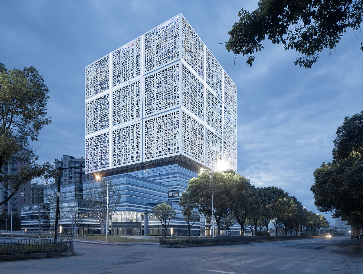 UAD completes Cube office building with staggered cubic volumes and lacework-clad tower in Hangzhou
