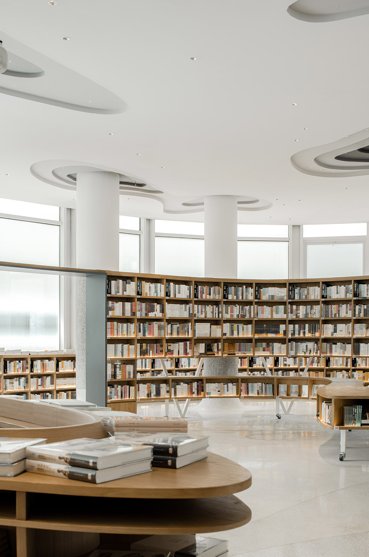a9a rchitects wraps Fang Suo - Fang Ting Bookstore with transparent glass curtain wall in China