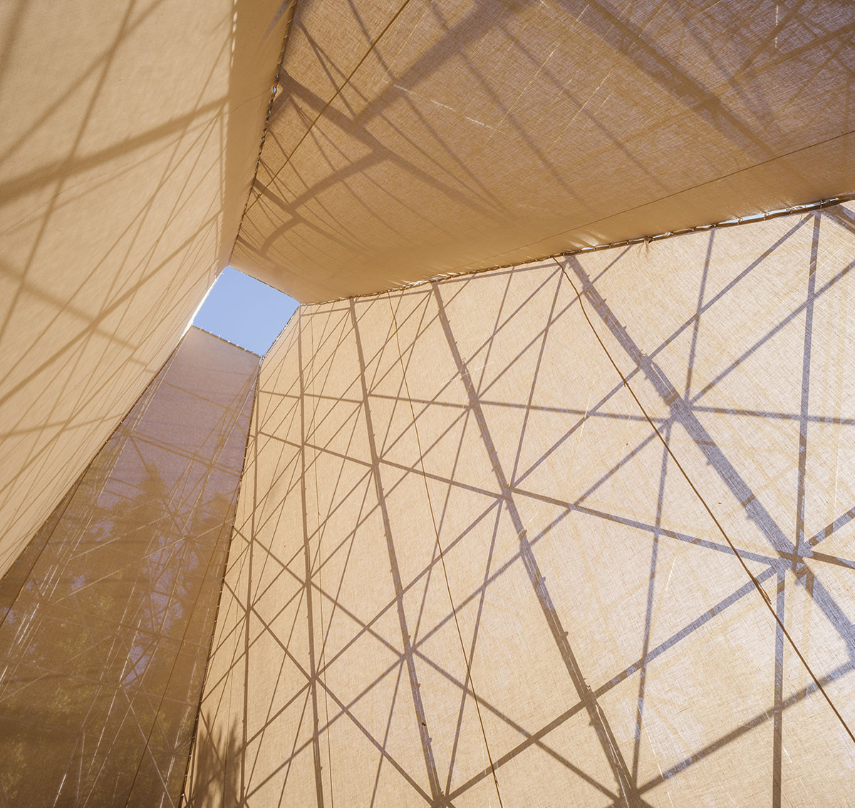 Aire Pavilion wrapped by giant scaffolding represents 