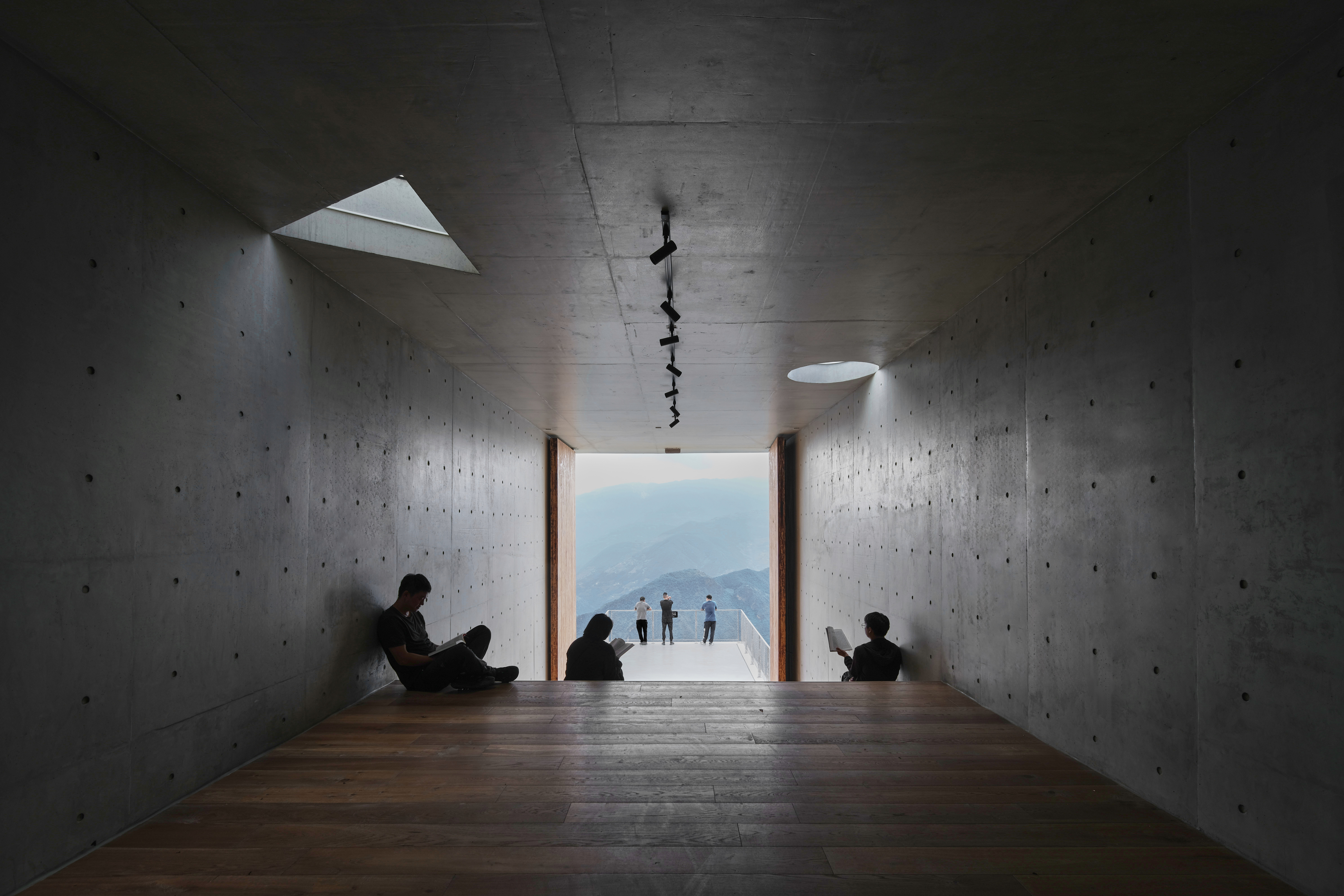 TAO completes concrete bookstore with protruding structure on a steep slope in China 