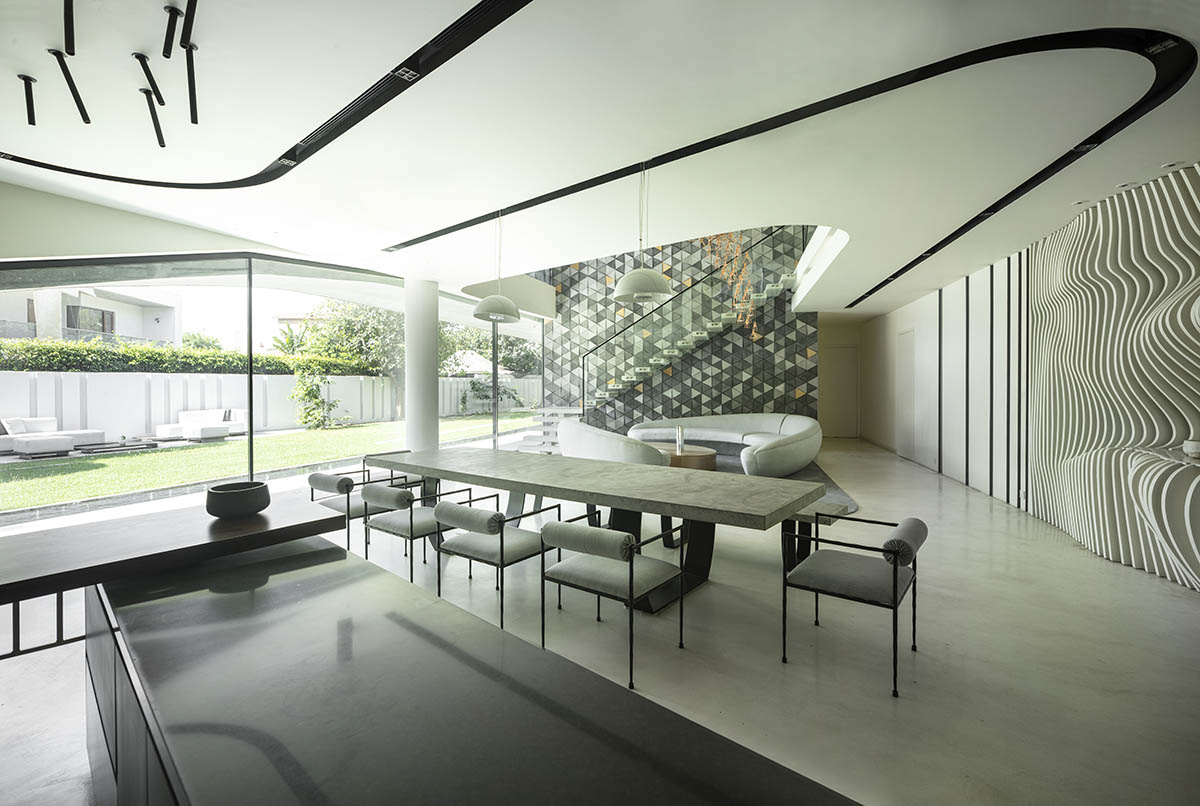 Sweeping concrete roof terrace forms private villa by Studio Symbiosis in India