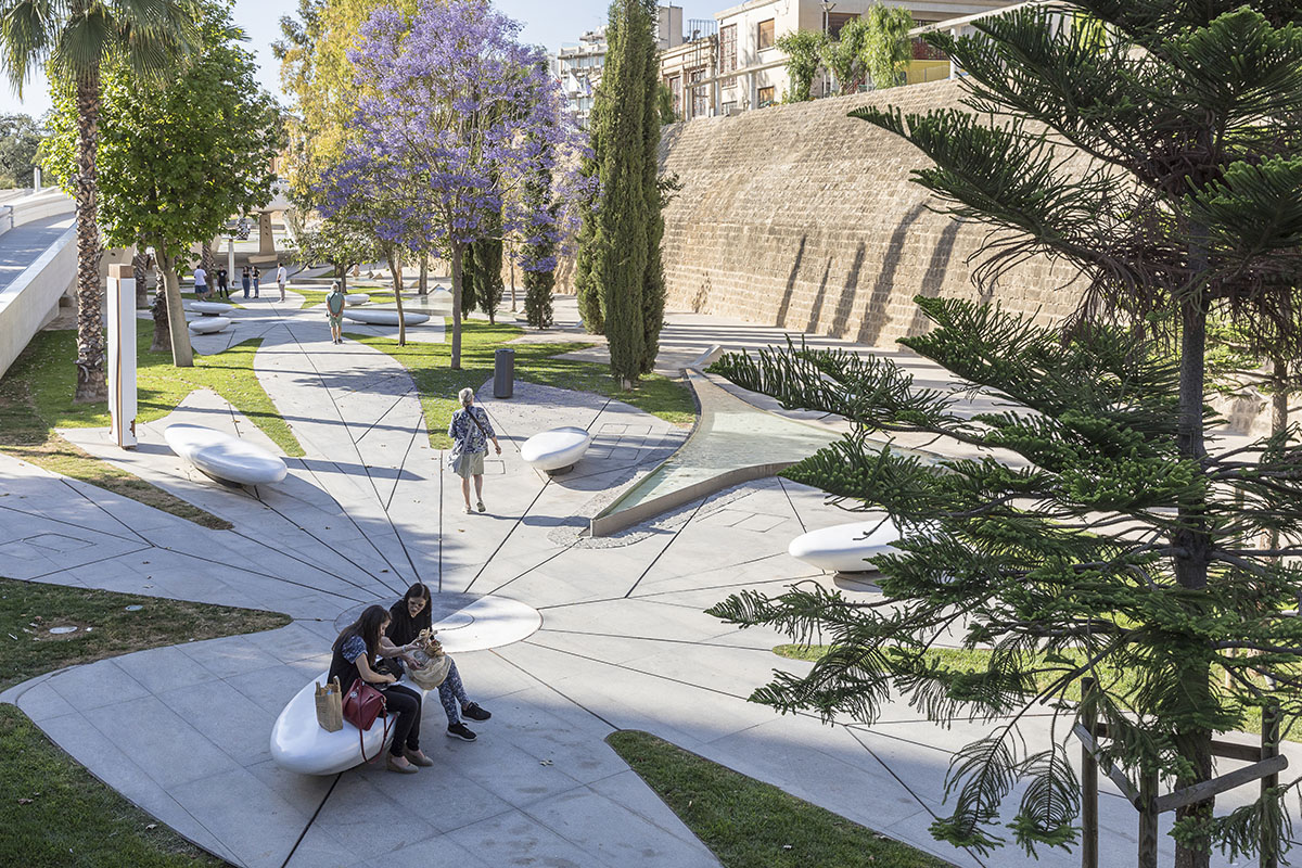 Zaha Hadid Architects designs urban park informed by fluid geometries opening the city's dry moat
