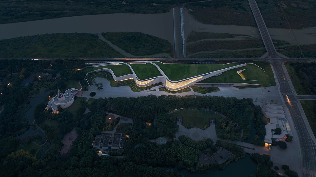 Mound-shaped museum by CSWADI rises from the earth like