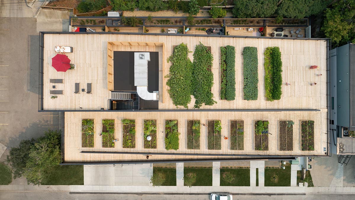 Multi-residential housing by MODA features a barrier-free rooftop urban farm in Calgary