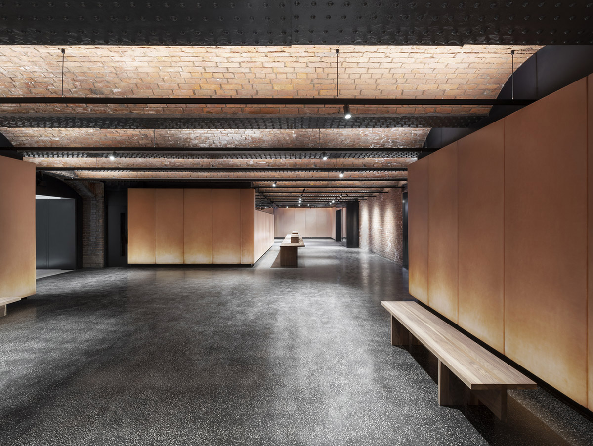 Carmody Groarke completes gallery that features brick vaulted ceilings and back-lit panels