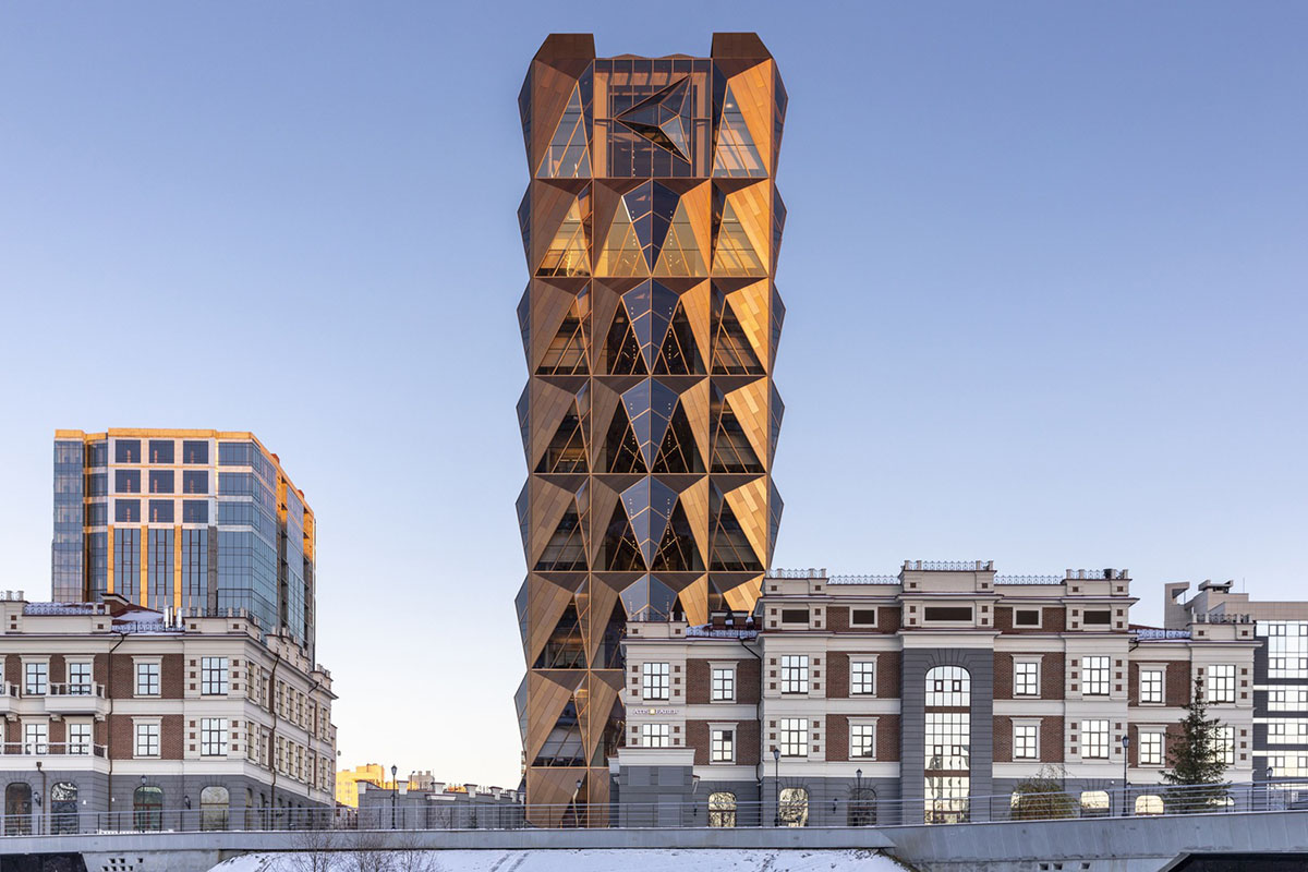 Foster + Partners completes office tower clad by triangular pieces of copper in Yekaterinburg