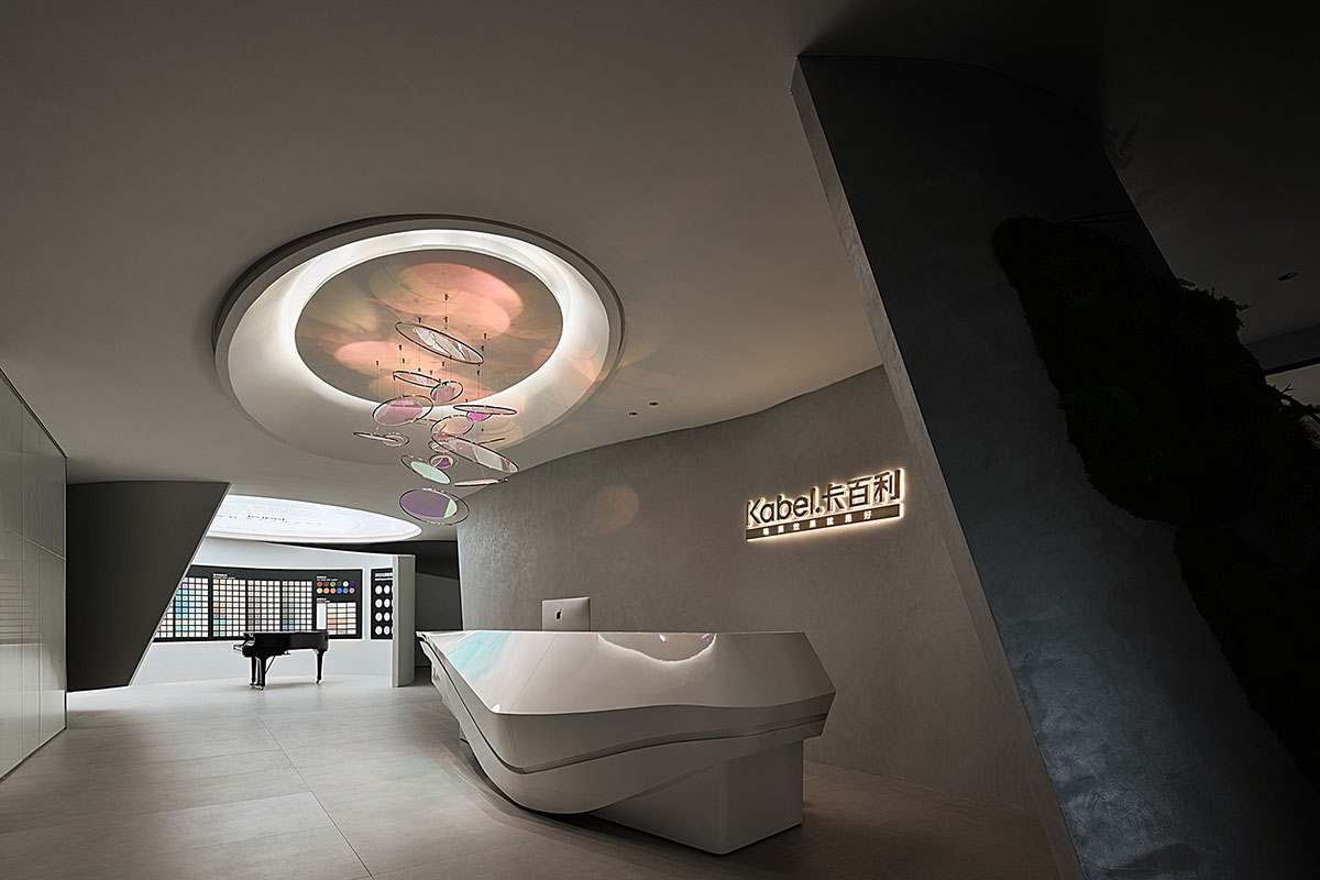 Exhibition hall interiors in China feature unconstrained flowing wall evoking
