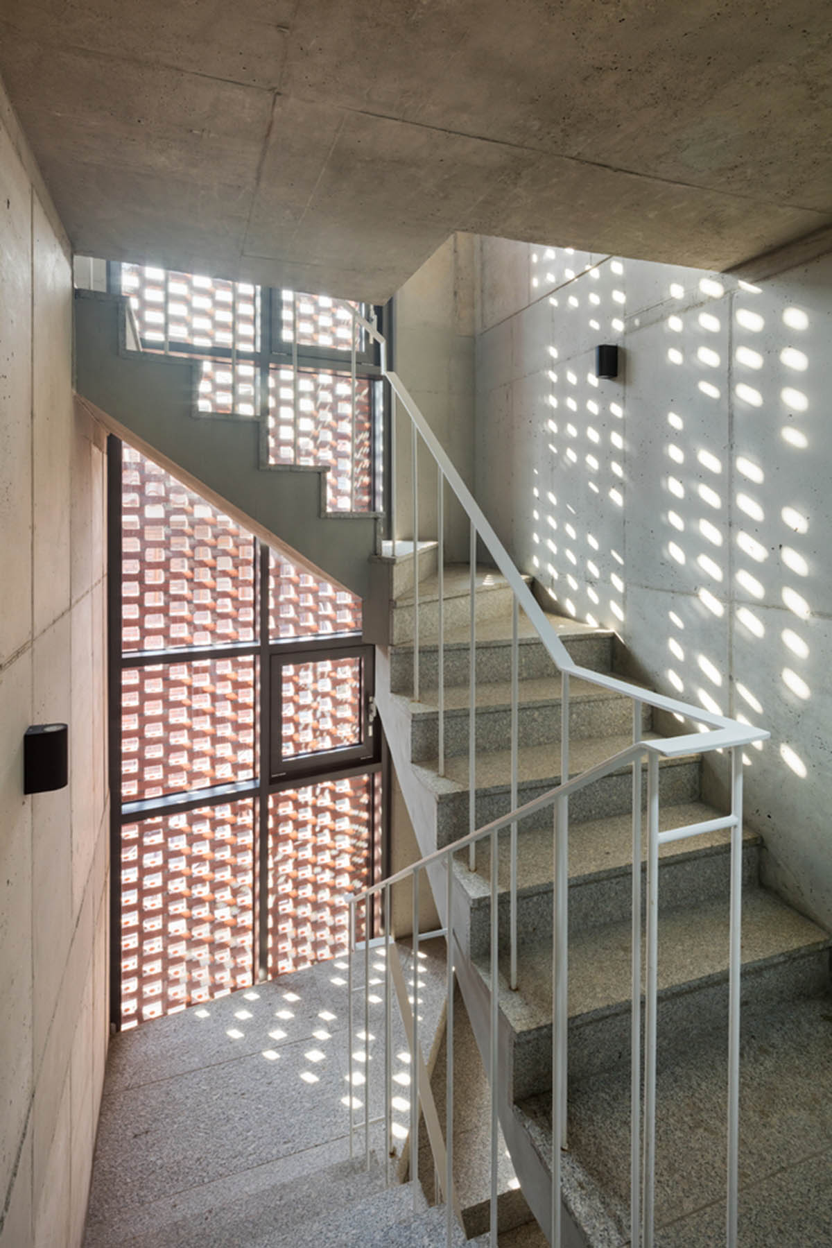 2m2 architects designed clay brick Sista House with inclined roof on narrow lot in Seoul