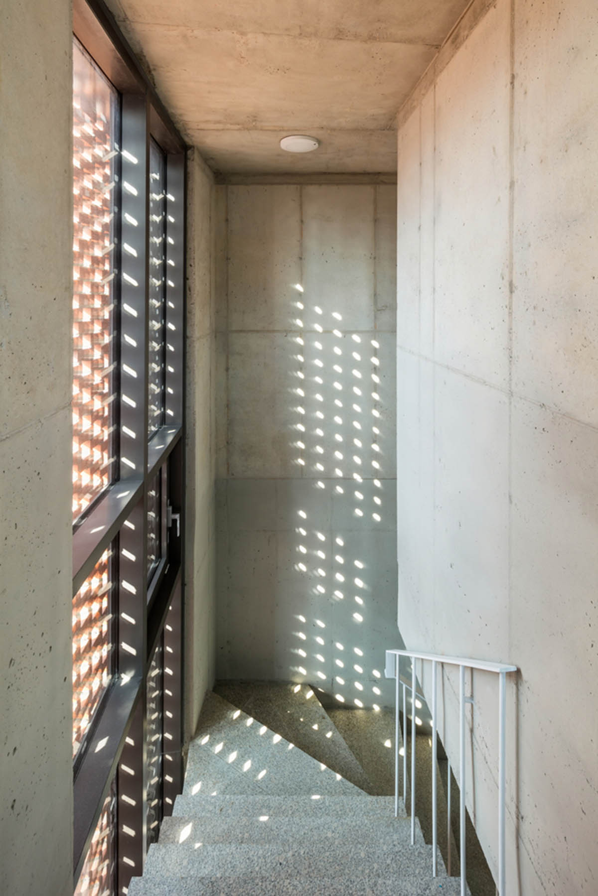 2m2 architects designed clay brick Sista House with inclined roof on narrow lot in Seoul