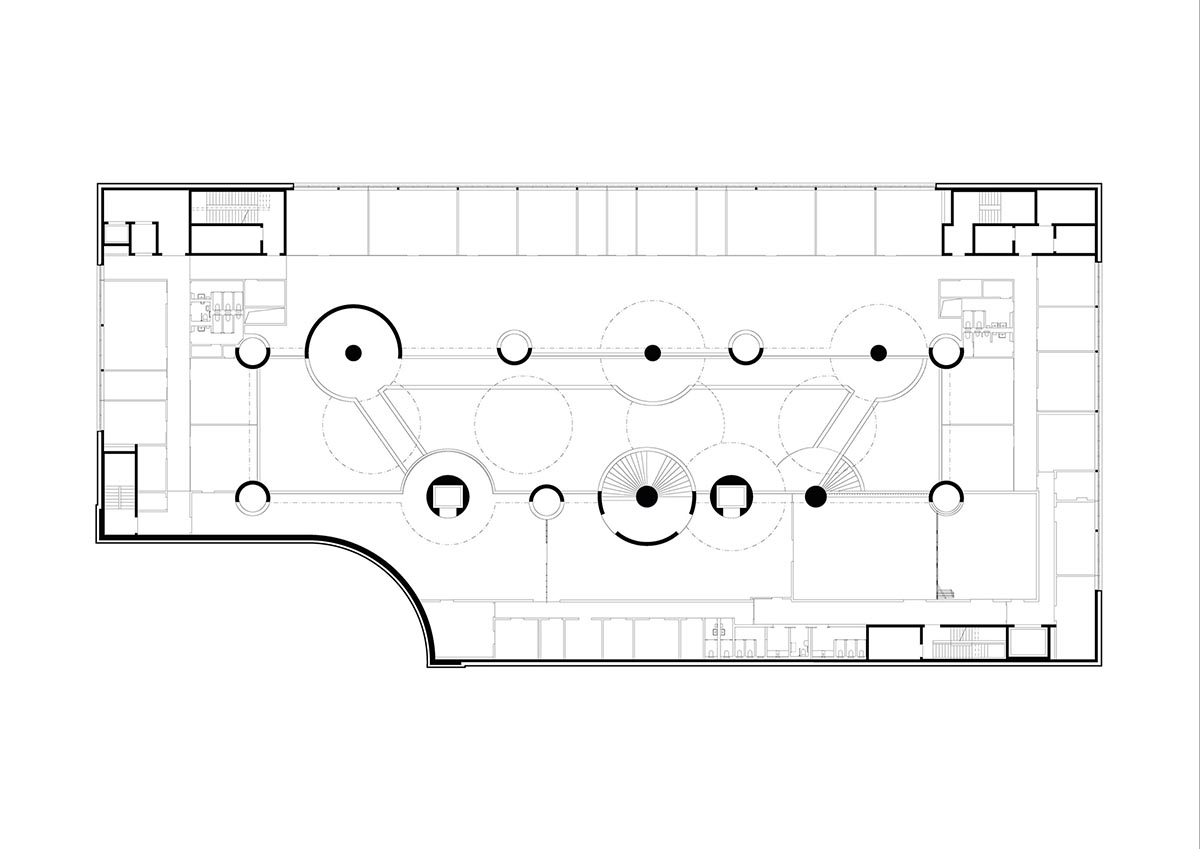 Cascading walkways wrap a vast atrium at Lindt Home of Chocolate designed by Christ & Gantenbein