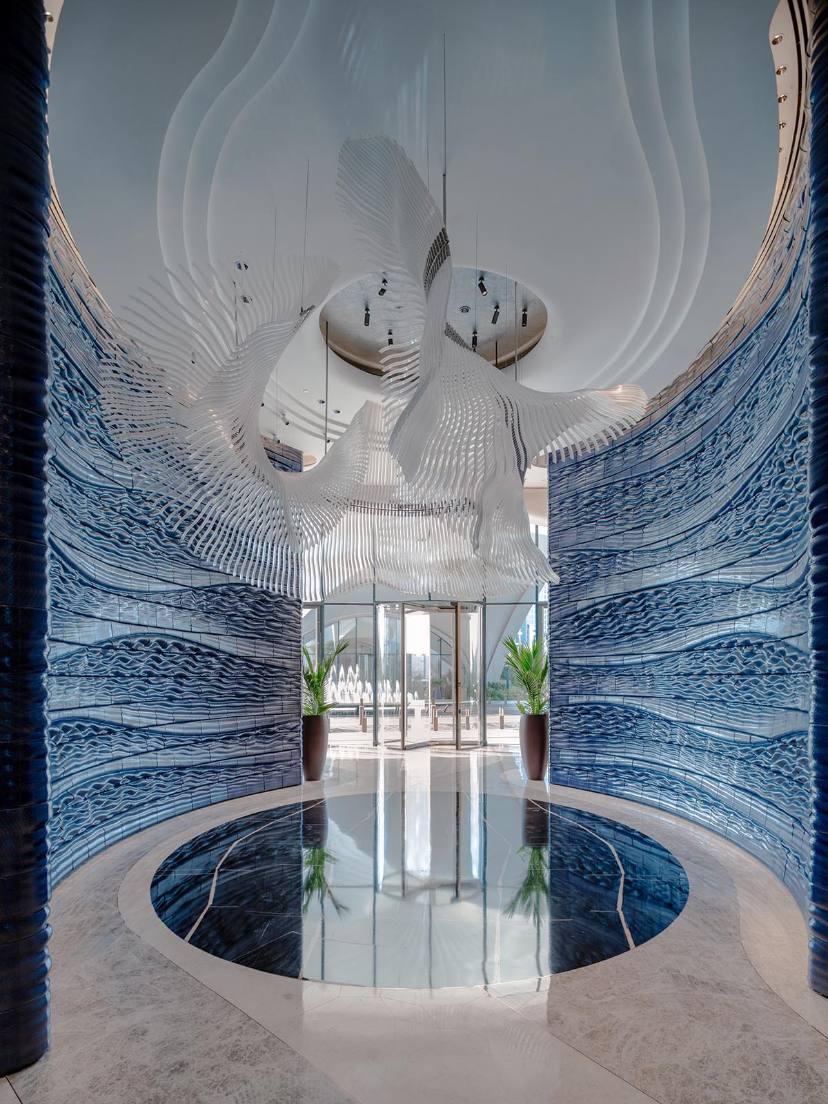 Studio RAP wraps the entrance of a hotel with majestic 3D printed ceramic walls 