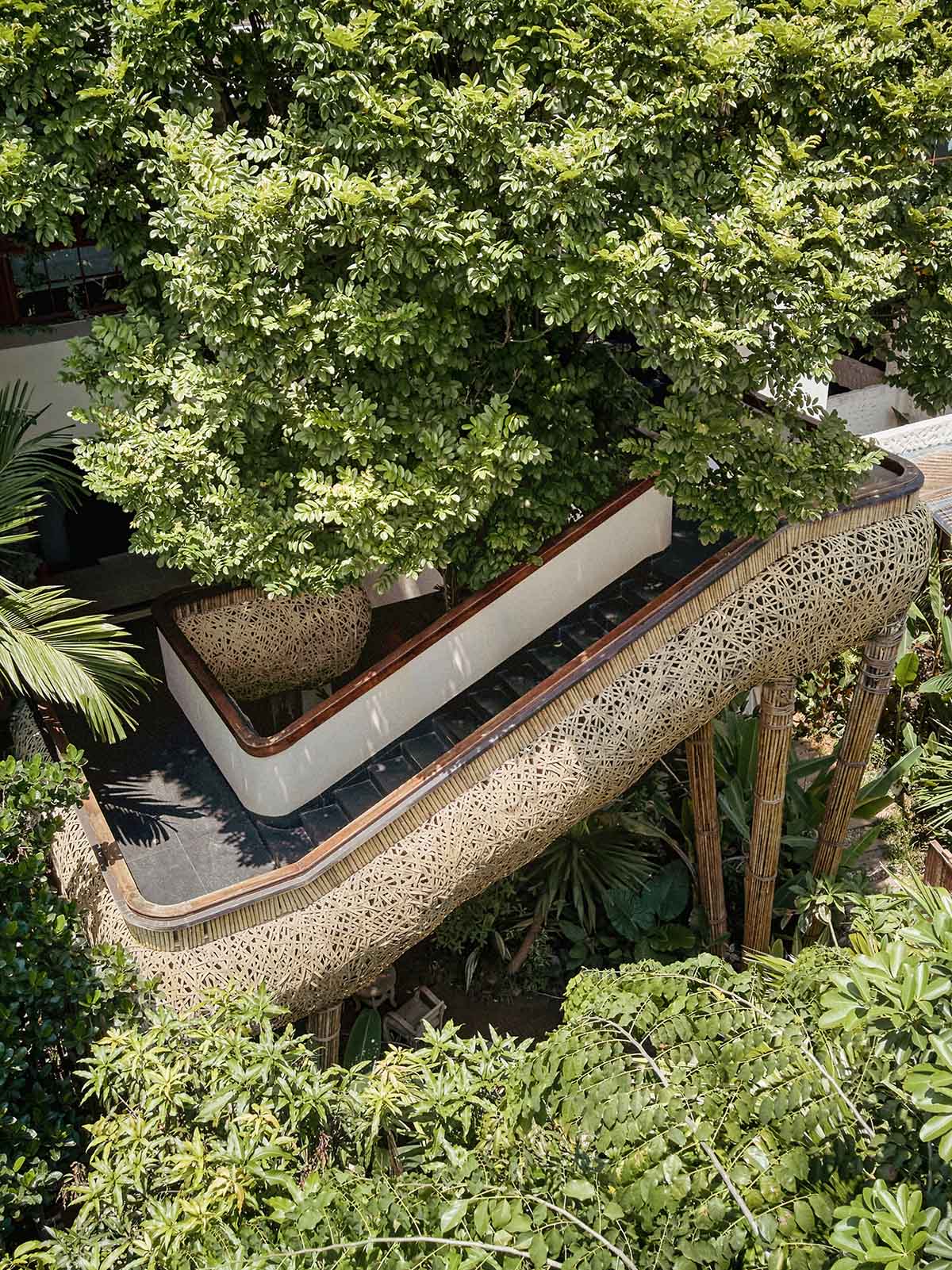Bamboo ladder and sheds surround cafe and resturant designed by Funs Design in China 