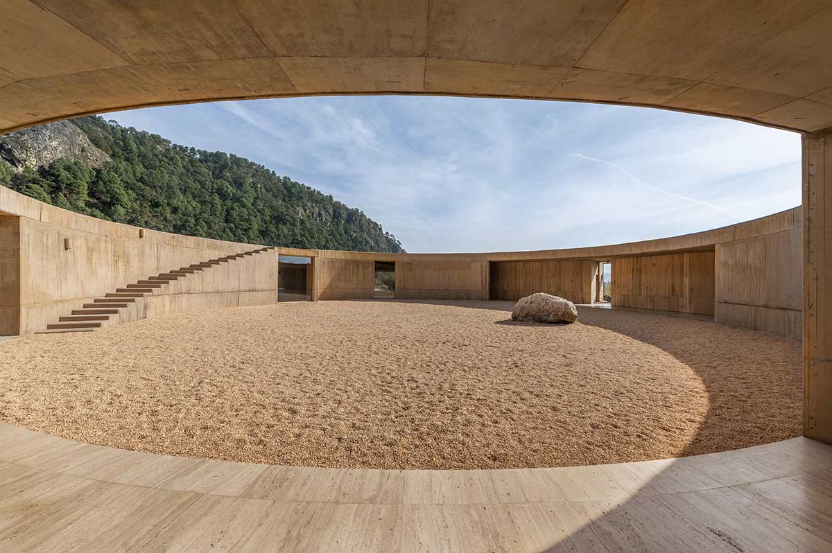 Fernanda Canales creates a circular home framing a mountain and a volcano in Mexico