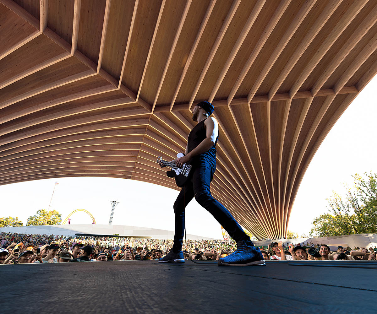 Revery Architecture covers the PNE Amphitheatre with a massive starburst timber roof in Vancouver 