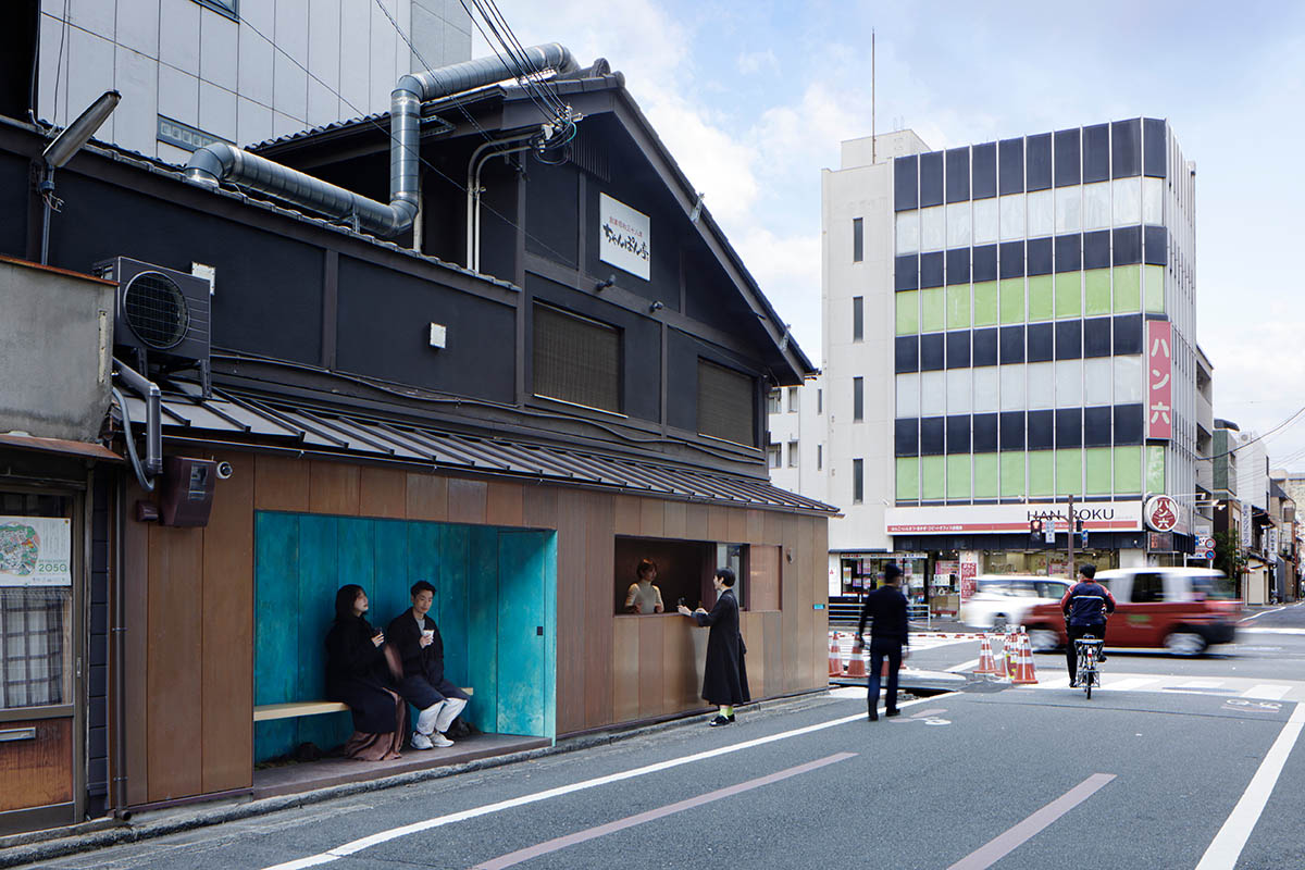 The one-meter-deep cafe invites customers with its patina color on its facade in Kyoto