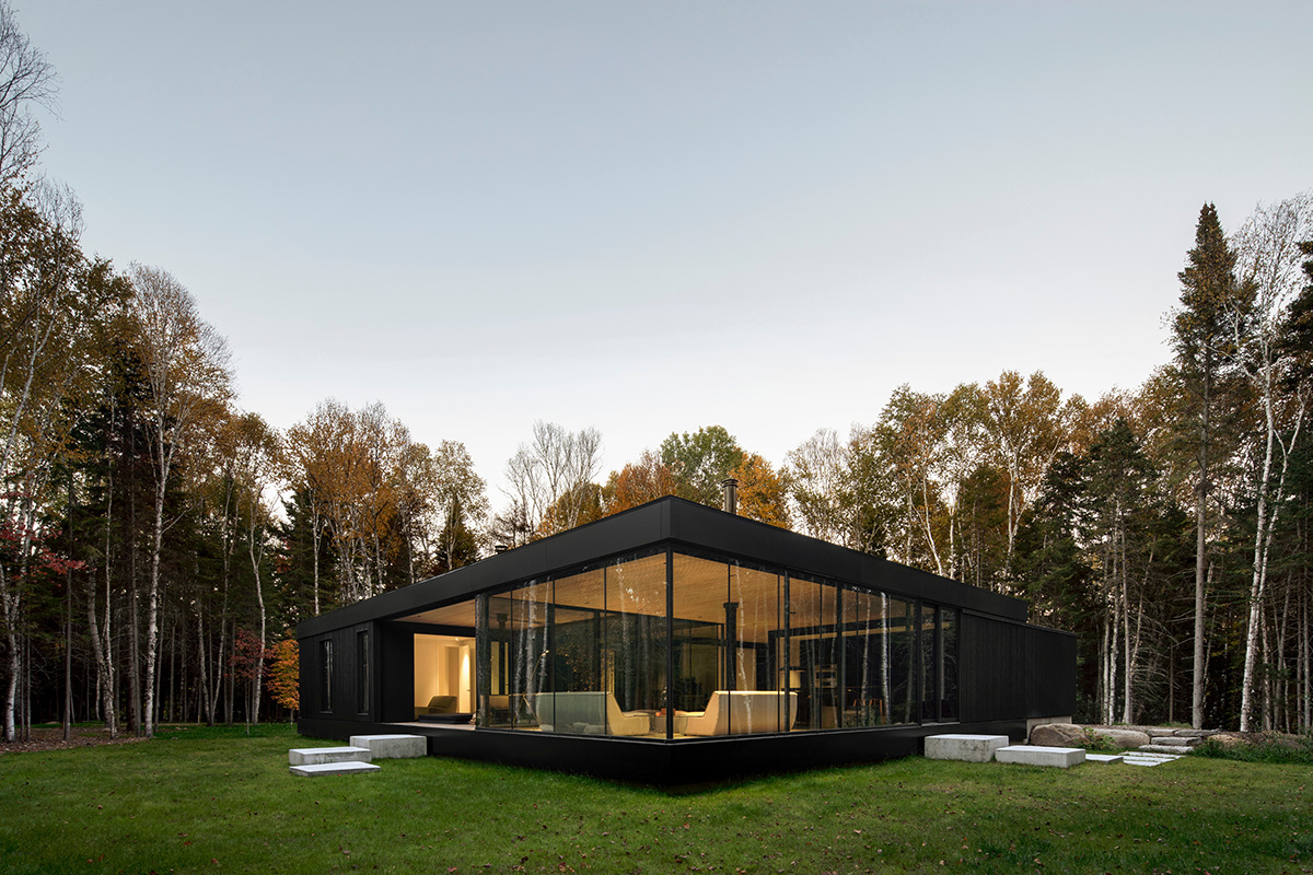 ACDF Architecture built a family glass house around an apple tree in Quebec