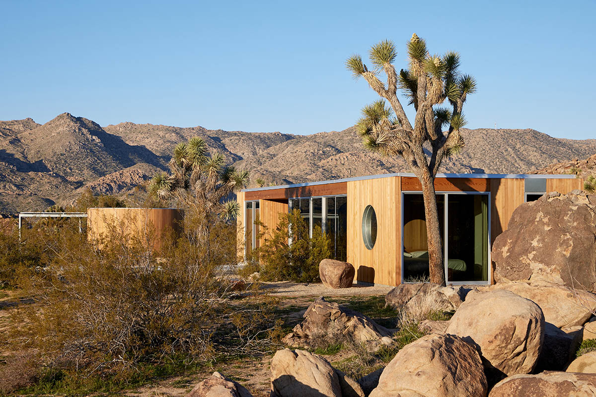Industry of All Nations built a wooden pavilion in the rugged natural landscape of the Mojave Desert