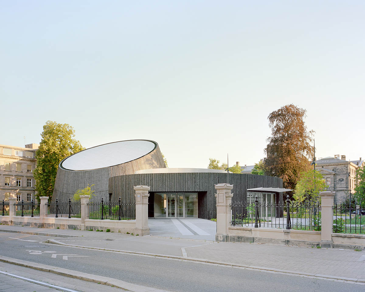 Planetarium clad in burnt wood at Université de Strasbourg evokes 19th century machine buildings