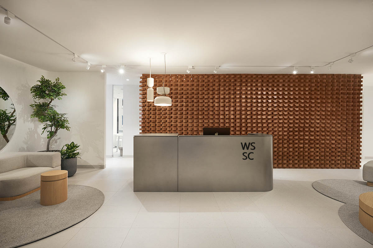 Surgical center features artisanal terracotta brick wall to reverse 