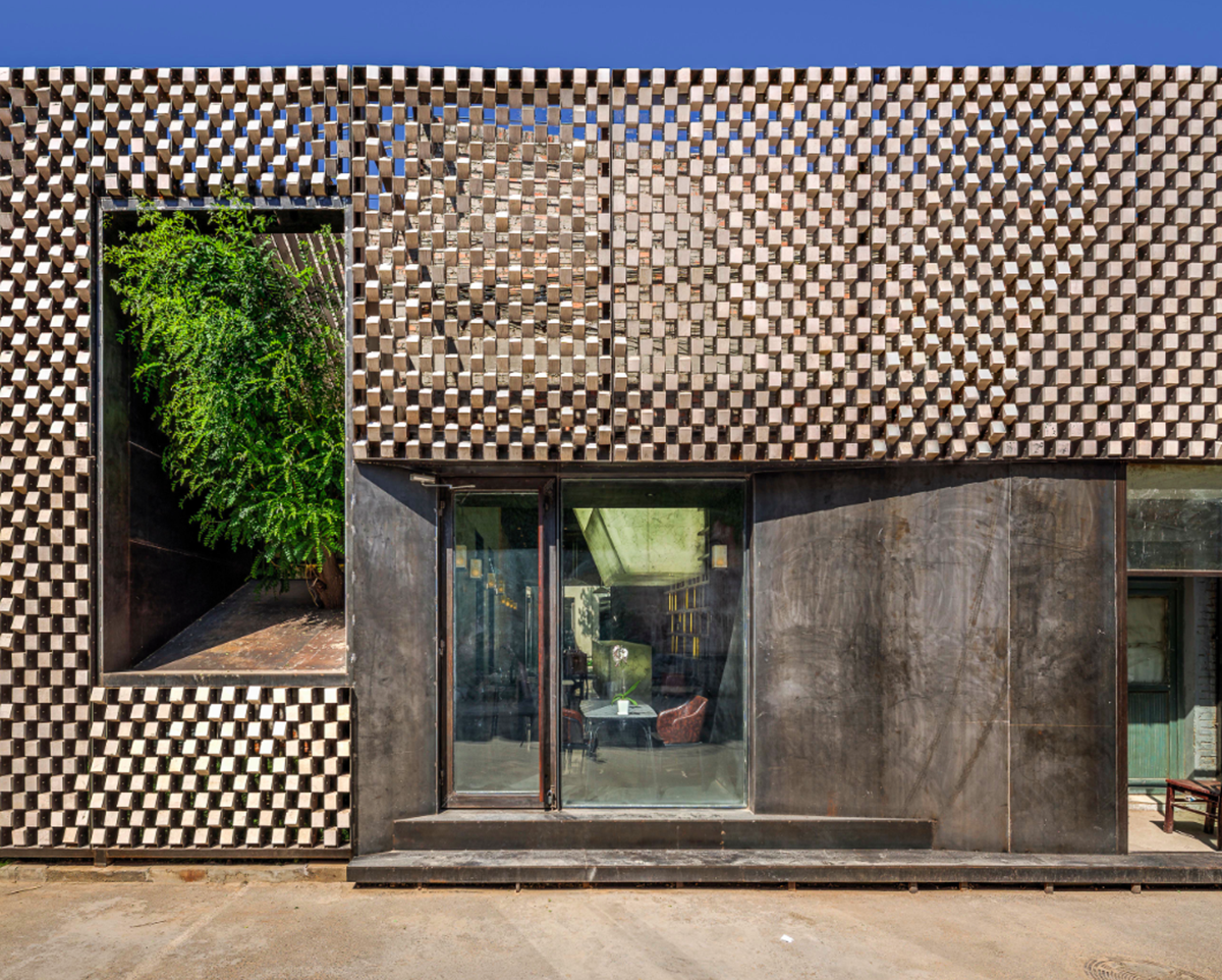 Atelier Alter converts old storage space into a stone archive using thousands of 10cm stone cubes