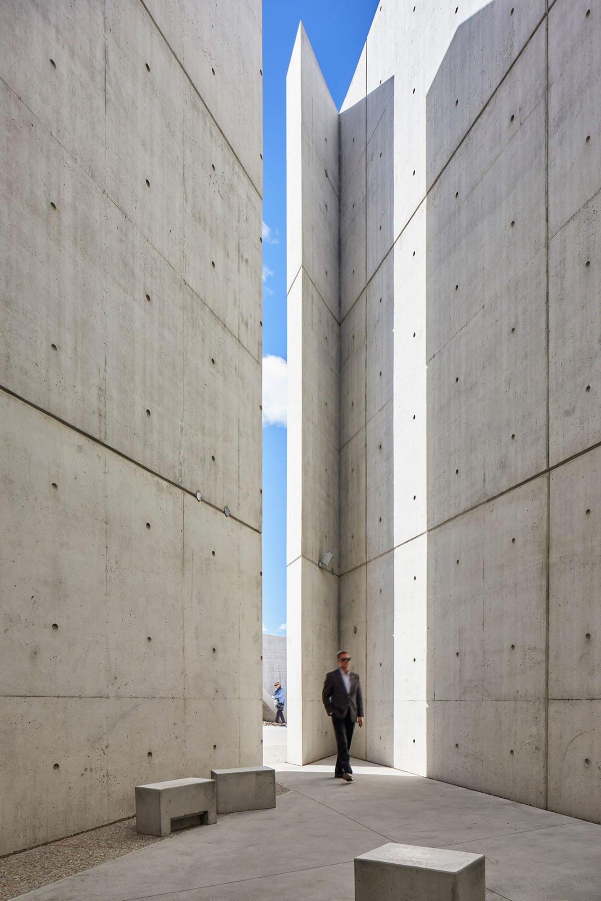 Daniel Libeskind’s Holocaust Monument features fragmented concrete walls creating rough landscape