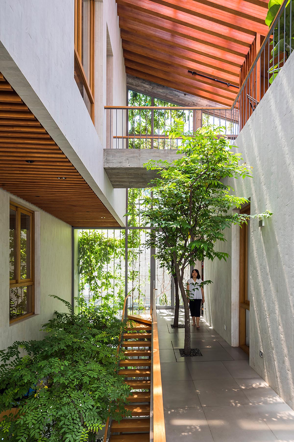 VTN Architects fills Stepping Park House with ivy plants and trees in Ho Chi Minh City