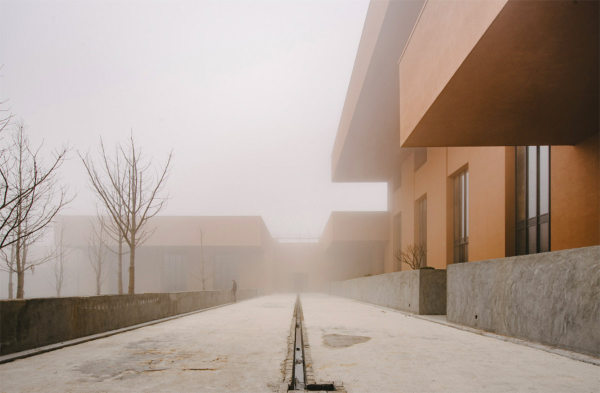 David Chipperfield completes Zhejiang Museum of Natural History with red ochre paint in Anji